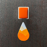 watercolour half pan and ombre droplet swatch of Pumpkin watercolour paint
