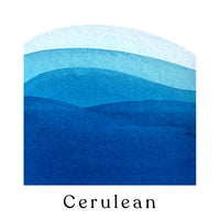 A swatch of graduated blue watercolour paint with the name of the colour (Cerulean) underneath.